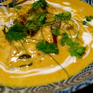 Chunks of sweet crab meat cook in rich turmeric flavors. 